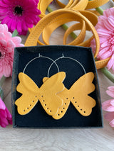 Sinisiipi korvakorut